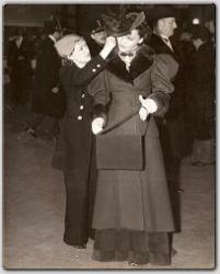 Maureen pauses for a moment to have her hat adjusted before stepping in front of the camera for here scenes in The Emperors Candlesticks.