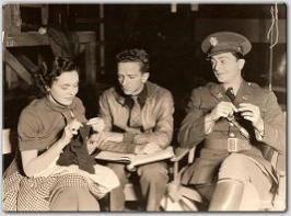 Maureen and Robert Young rehearse their dialogue for MGM's West Point of the Air.