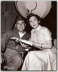 John Hodiak and Miss O'Sullivan rehearse their lines between scenes in Columbia's Mission Over Korea.