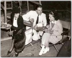 Benita Hume, John Buckler, and Maureen have lunch on the set of MGM's Tarzan Escapes.